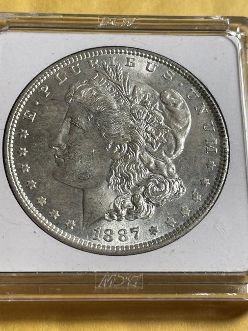 1887-P BU CONDITION MORGAN SILVER DOLLAR AS PICTURED. (1 of 2)