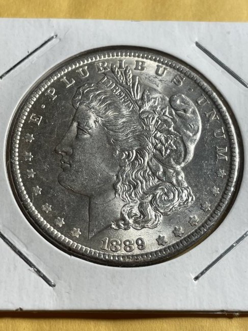1889-P BU CONDITION MORGAN SILVER DOLLAR AS PICTURED. (1 of 2)