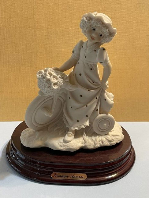 Guiseppe Armani Girl on a Tricycle Capodimonte Alabaster Figurine...: Guiseppe Armani Girl on a Tricycle Capodimonte Alabaster Figurine in VG Preowned Condition. $15 Domestic Shipping. No International Shipping.