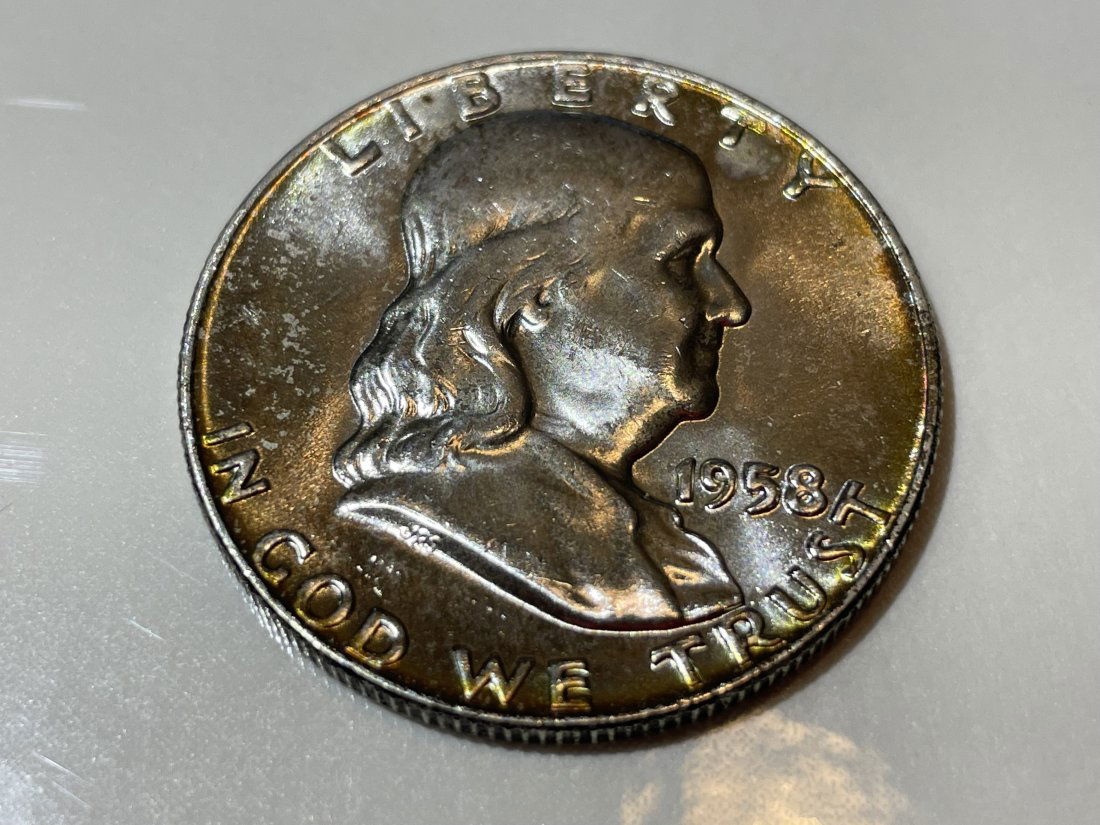 1958-D CHOICE UNCIRCULATED CONDITION FRANKLIN SILVER HALF DOLLAR. (1 of 2)