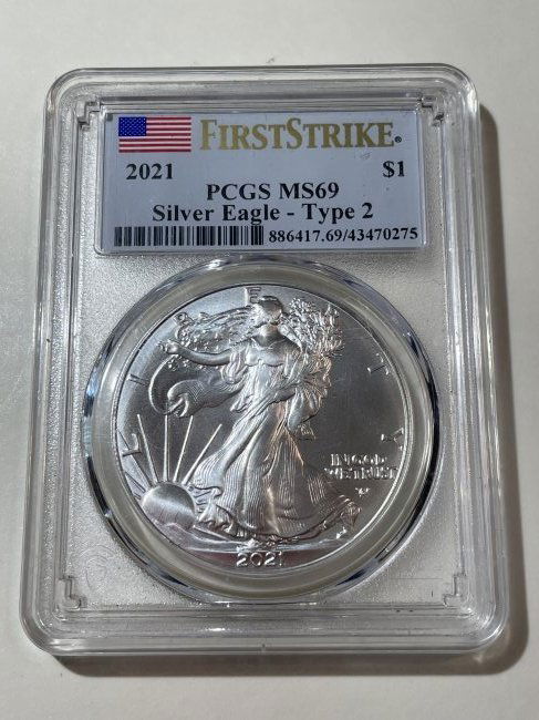 PCGS Certified 2021 First Strike Silver Eagle S$1 MS69 Type-2 1-Ounce Coin. (1 of 4)