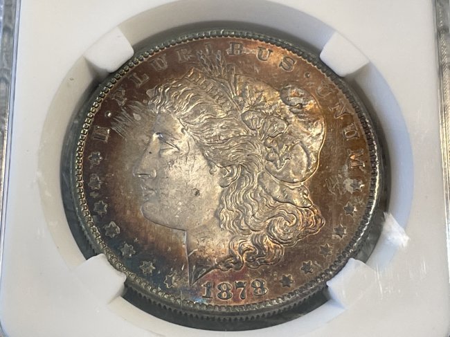 1878-S SUPERB OBVERSE TONED UNCIRCULATED MORGAN SILVER DOLLAR PREOWNED FROM AN ESTATE. (1 of 2)