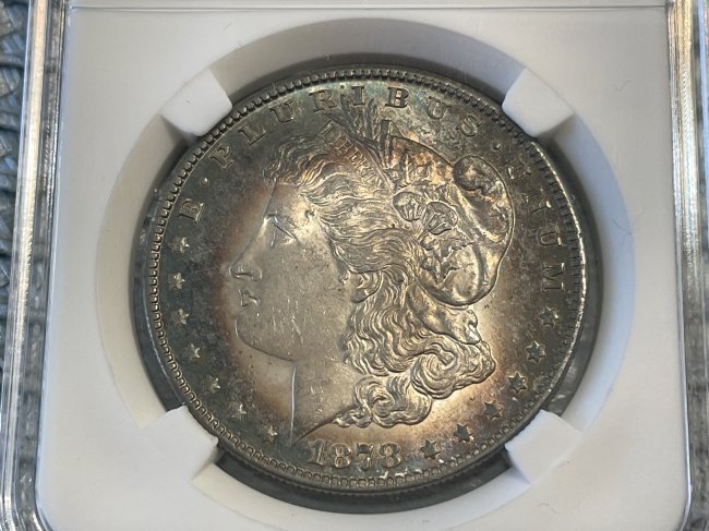 1878-S SUPERB OBVERSE TONED UNCIRCULATED MORGAN SILVER DOLLAR PREOWNED FROM AN ESTATE. (1 of 2)