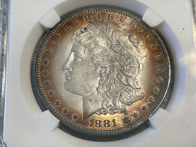 1881-P SUPERB OBVERSE TONED UNCIRCULATED MORGAN SILVER DOLLAR PREOWNED FROM AN ESTATE. (1 of 2)