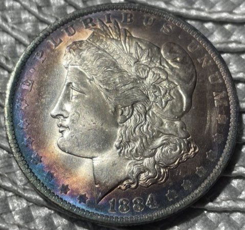 1884-O SUPERB TONED RIMS BU CONDITION MORGAN SILVER DOLLAR. (1 of 2)