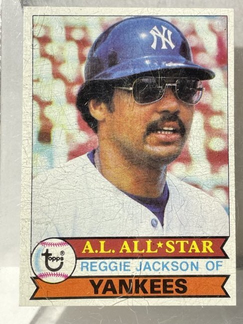 REGGIE JACKSON #700 BASEBALL CARD NICE CORNERS. FREE DOMESTIC SHIPPING.: REGGIE JACKSON #700 BASEBALL CARD NICE CORNERS. FREE DOMESTIC SHIPPING. CARDS ARE IN REAL NICE SHAPE BUT SOME OF THE LUCITE HOLDERS HAVE SCRATCHES AND STICKER RESIDUE.