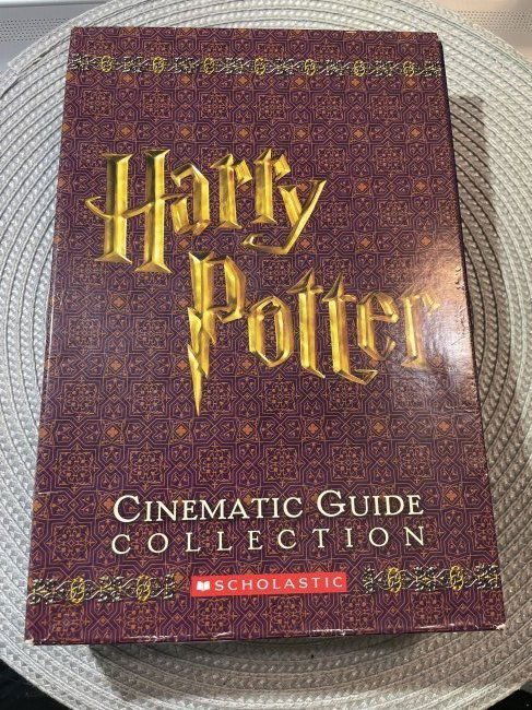 Harry Potter: Cinematic Guide Collection (Harry Potter) by Scholastic: 4-Used in VG Condition: Harry Potter: Cinematic Guide Collection (Harry Potter) by Scholastic: 4-Used Hardcovers in VG Condition. $7 Domestic Shipping. (On Multiple Lots Won, the Shipping Fees will be combined or Adjusted Ac