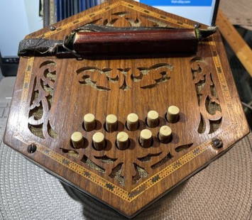 Vintage Antique Made in Germany Hand Cut Wooden Accordion Instrument w/20 Buttons.: Vintage Antique Made in Germany Hand Cut Wooden Accordion Instrument w/20 Buttons. 1-Missing Button and Needs 2 New Leather Bands.