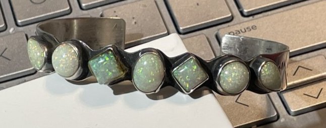 Vintage NAVAJO Signed "ES" 7-Opals Sterling Silver CUFF Bangle Bracelet Standard Size Preowned: Vintage NAVAJO Signed "ES" 7-Opals Sterling Silver CUFF Bangle Bracelet Standard Size Preowned from an Estate as Pictured. $7 Domestic Inhouse Shipping.