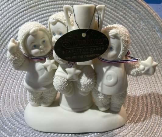 Snowbabies Figurine 2003 "We Are The Champions" Preowned in Good Condition as Pictured.: Snowbabies Figurine 2003 "We Are The Champions" Preowned in Good Condition as Pictured. $7 Domestic Inhouse Shipping. (On Multiple Lots Won, The Shipping Fee will be Combined or Adjusted Accordingly)