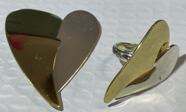 Designer RLM Studio Robert Lee Morris Brass & Sterling Silver Ring Size-8 and Matching Pendant: Designer RLM Studio Robert Lee Morris Brass & Sterling Silver Ring Size-8 and Matching Pendant in Never Worn Condition. $7 Domestic Inhouse Shipping.