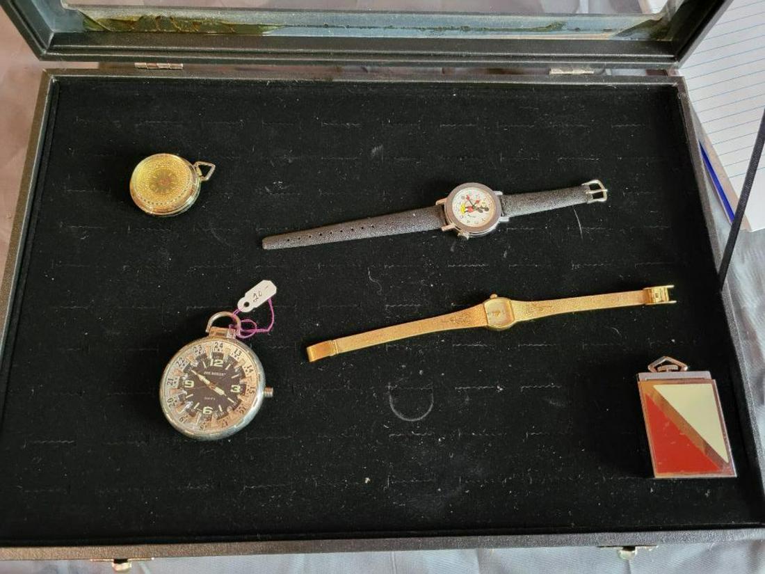Small display case with assorted watches (1 of 10)