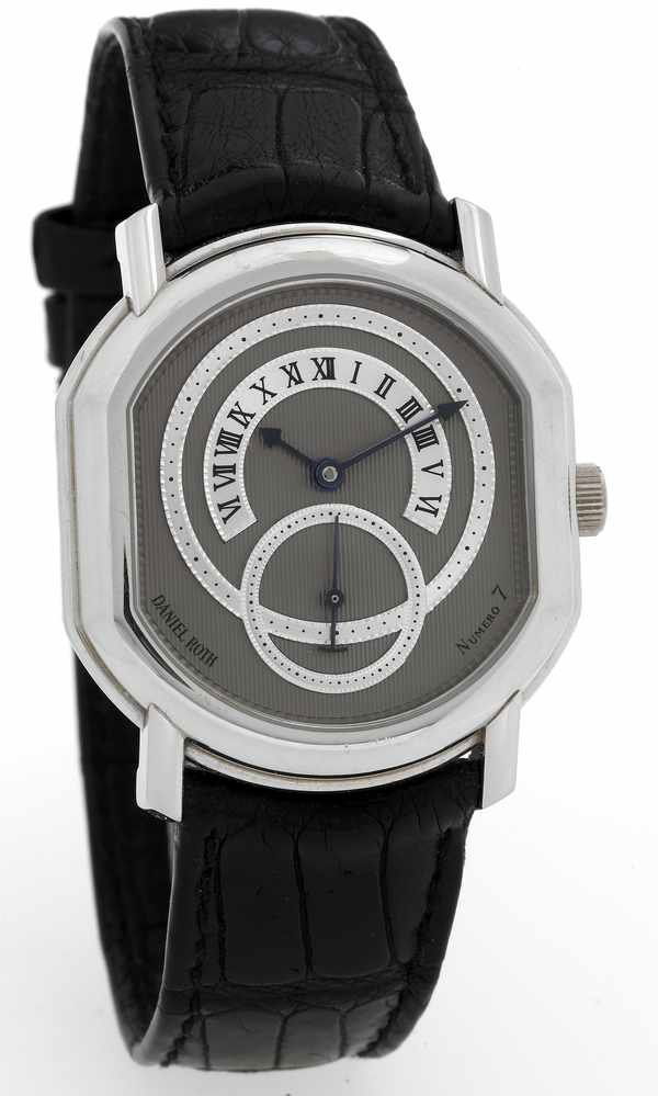 Daniel Roth 807 Platinum Premier Retrograde Hour: Daniel Roth, "Platinum Premier," No. 7, Ref. 807. Made in the 1990s. Very fine, double ellipse-shaped, large seconds, plat- inum wristwatch with retrograde hours and a platinum Daniel Roth buckle. C.