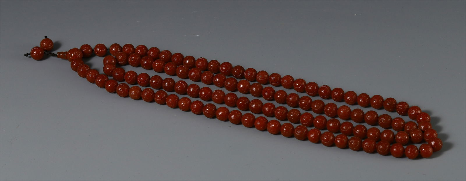 A CHINESE ANCIENT AGATE CARVED BEAD BUDDHIST BRACELET (1 of 5)