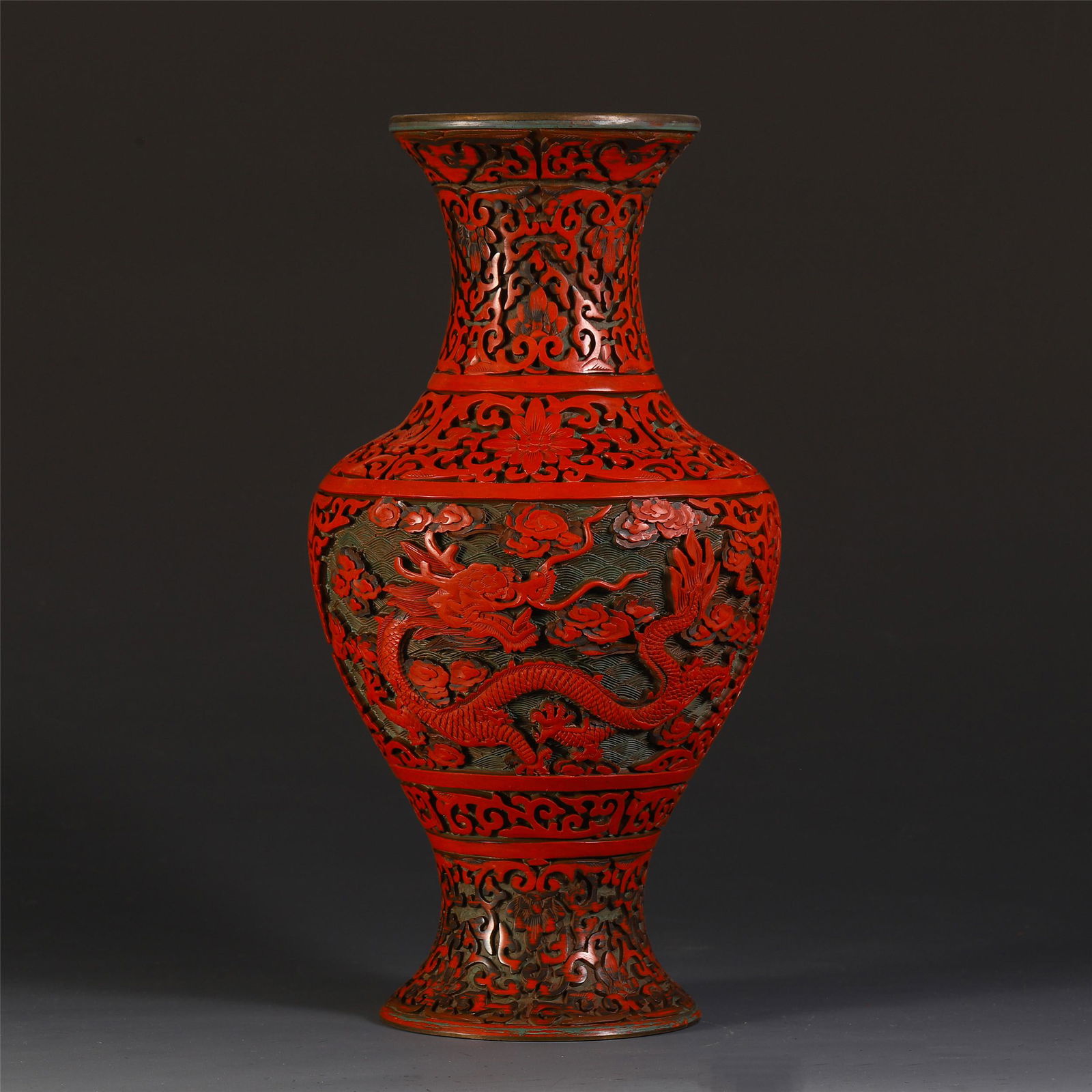 A CHINESE CINNABAR CARVED DRAGON CLOUD PATTERN  MOTIF (1 of 8)