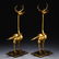 A PAIR OF CHINESE GILT BRONZE BEAST TABLE ITEM
