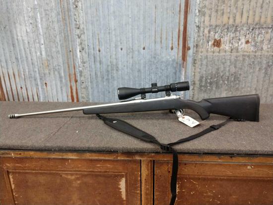 Savage Model 116 .300 Win Mag Bolt Action: 78.4 Stainless with ported barrel SN G023799