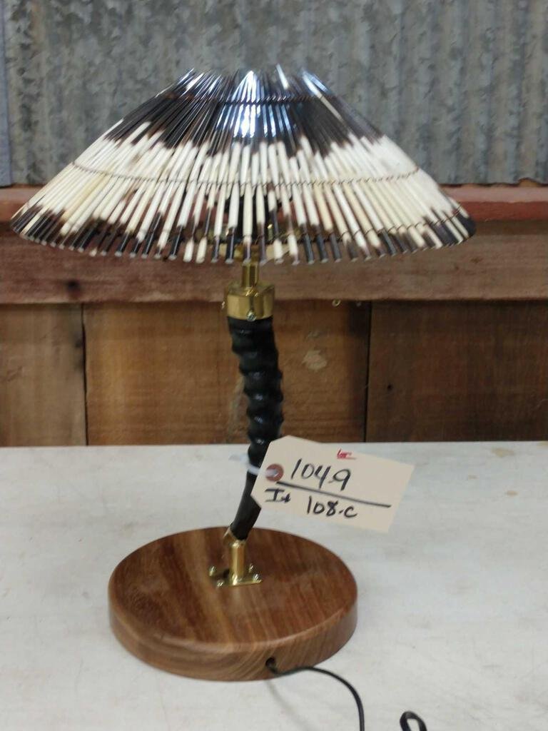 African Springbok Horn Lamp: 104.9 Brand New lamp hand crafted in south Africa Horn is polished to a high Sheen with a Porcupine quill shade 17" tall x 13" wide