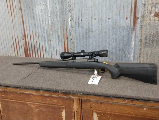 Savage Axis .223 Bolt Action: 92.1 Like New has seen little if any use with Weaver Scope SN N547245