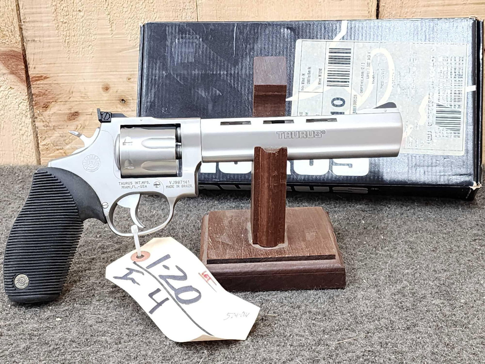 Taurus Tracker .22 7 Shot Revolver: 1.20 Like new condition stainless 6.5" barrel with original box SN VJ987141