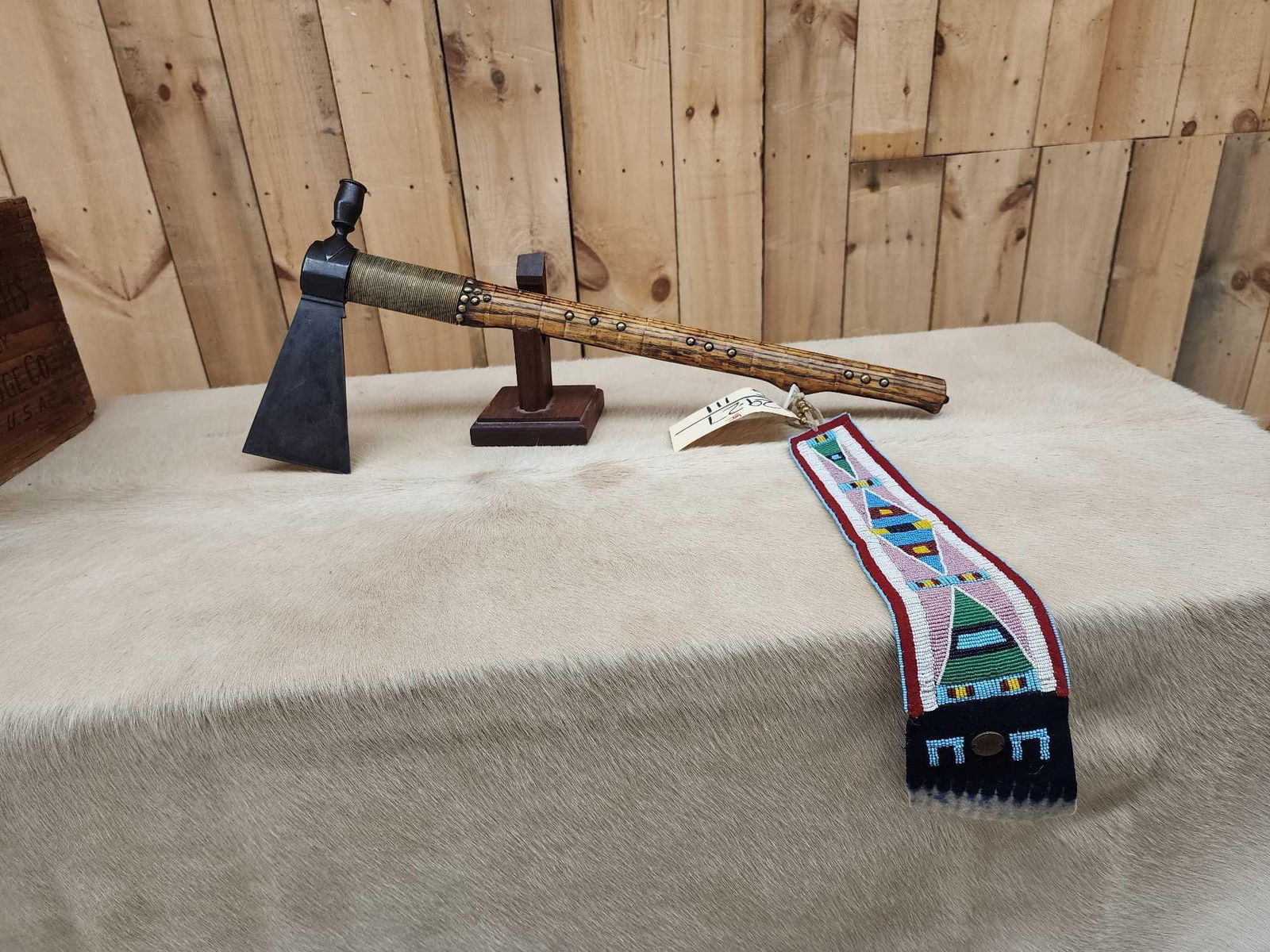 Western Plains Indian Style Tomahawk Pipe: 29.27 Spotted handle with seed beaded hanger