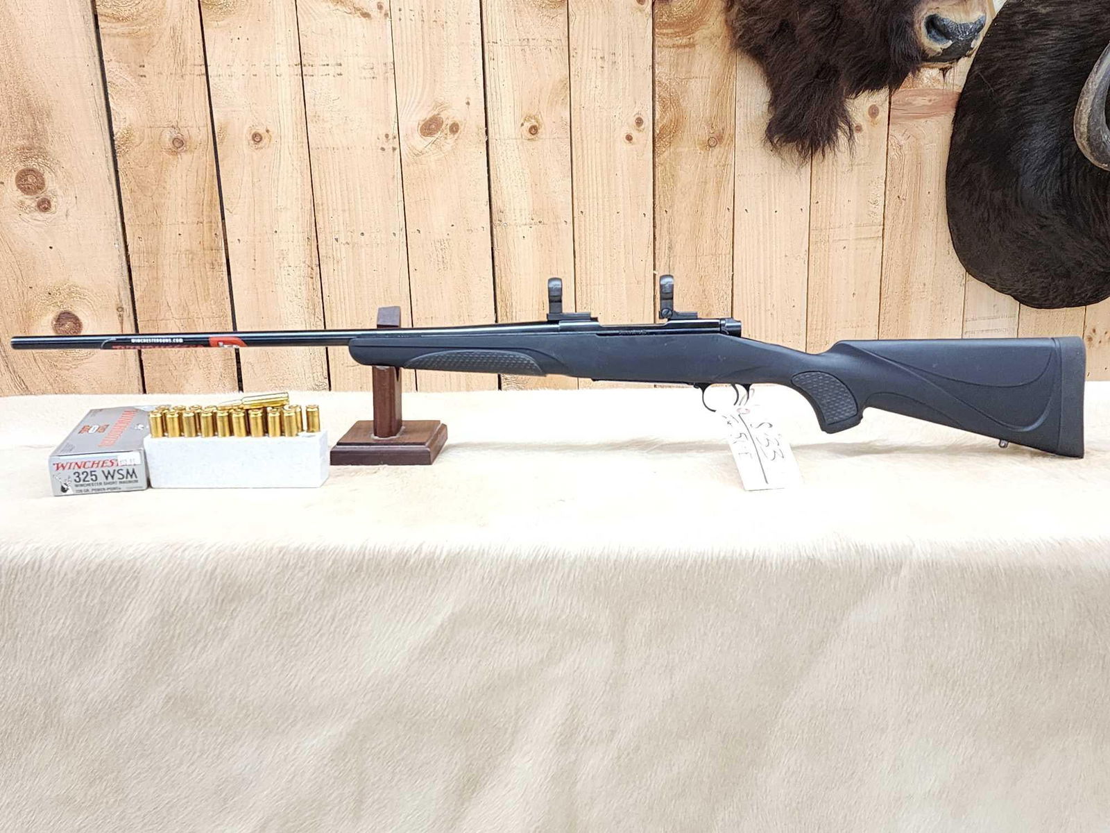 Winchester Model 70 .325 Winchester Short Mag Bolt Action Rifle: 18.33 Has seen little use comes with 20 rounds of Ammunition SN 35AMN09964