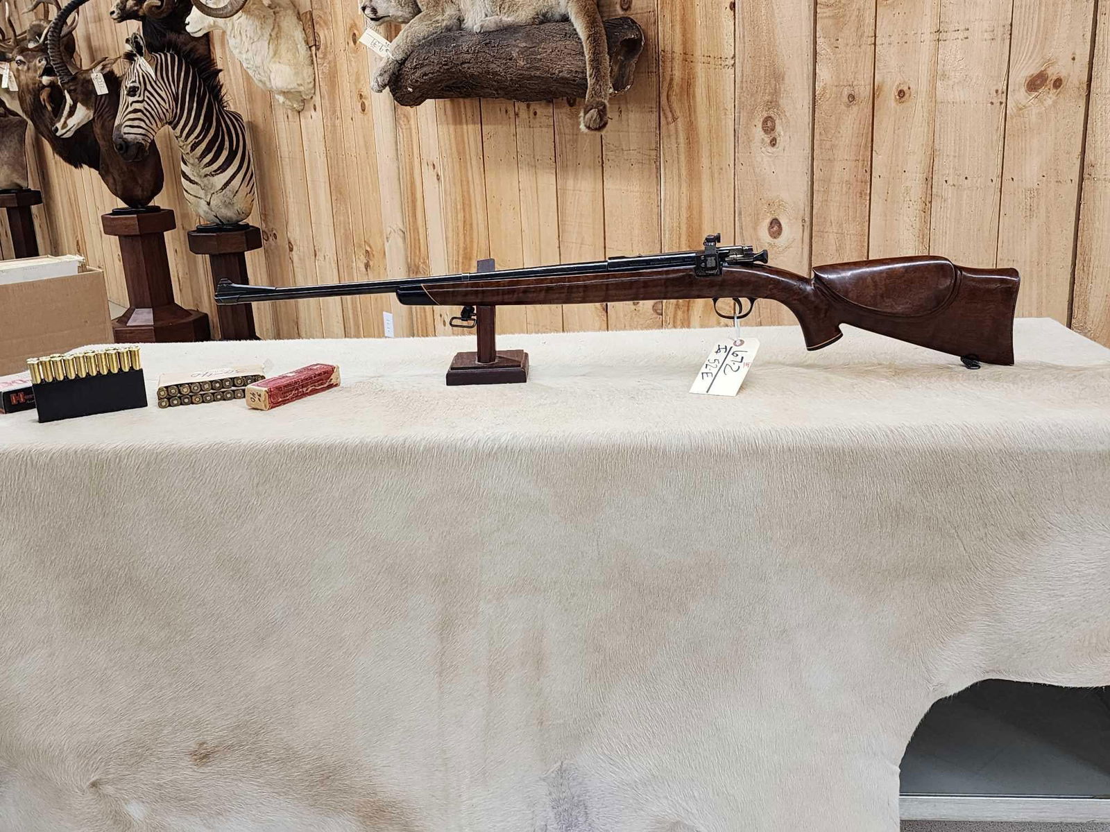 U.S Springfield Armory Model 1898 30-40 Krag Bolt Action Rifle: 67.2 Custom sporterized with Redfield rear peep sight Lyman front sight action is very crisp comes with 38 rounds Of ammo SN 374903