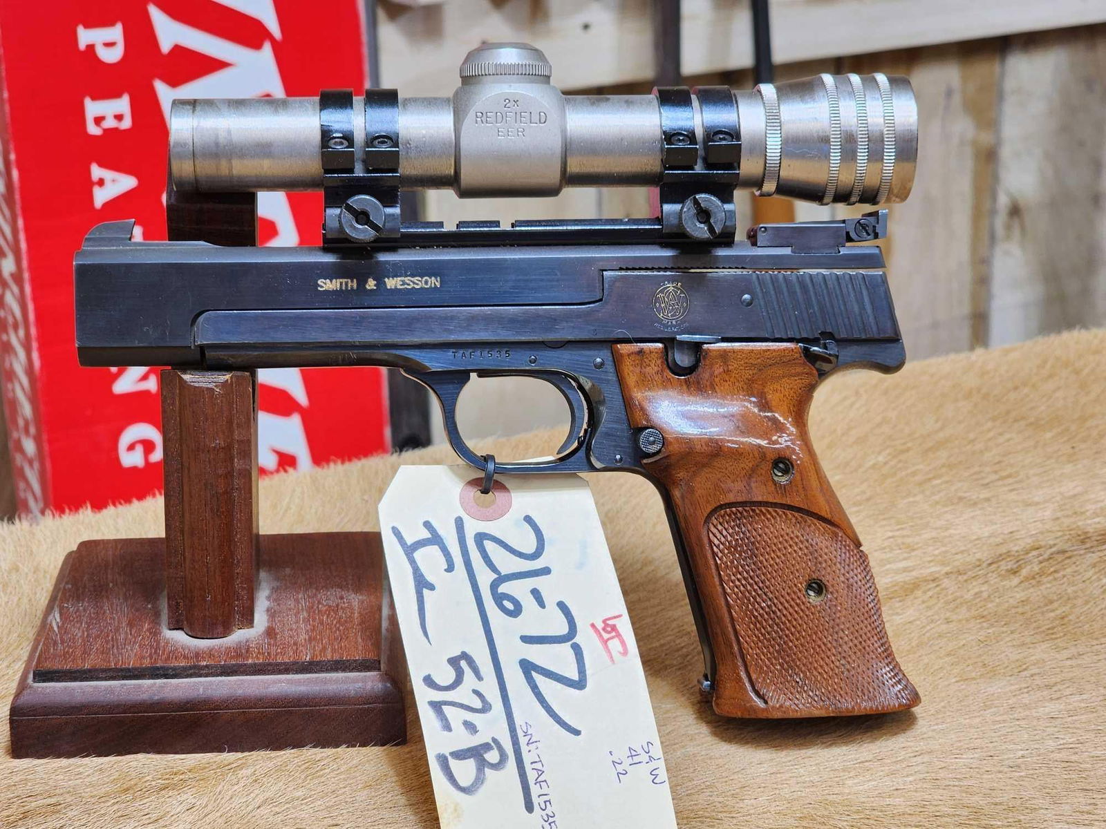 Smith & Wesson Model 41 .22 Semi Auto Pistol: 26.72 Nice gun great finish crisp action shiny bore Redfield scope SN TAF1535