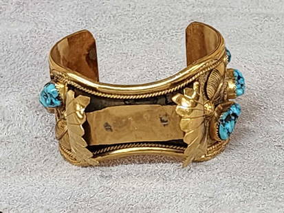 Native American Style Watch Bracelet Cuff: 73.17 Finely detailed gold plated with Turquoise signed by the maker M. Haley