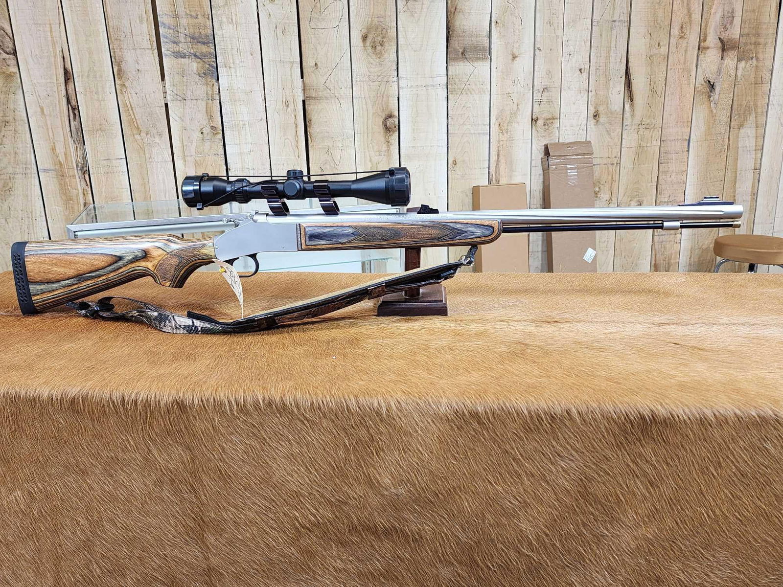 Knight KRB7 50cal Black Powder Rifle: 88.4 Pretty gun stainless fluted barrel with Traditions Scope with see through rings SN NA This requires a FFL since this gun can have any centerfire or shotgun barrel added to it.