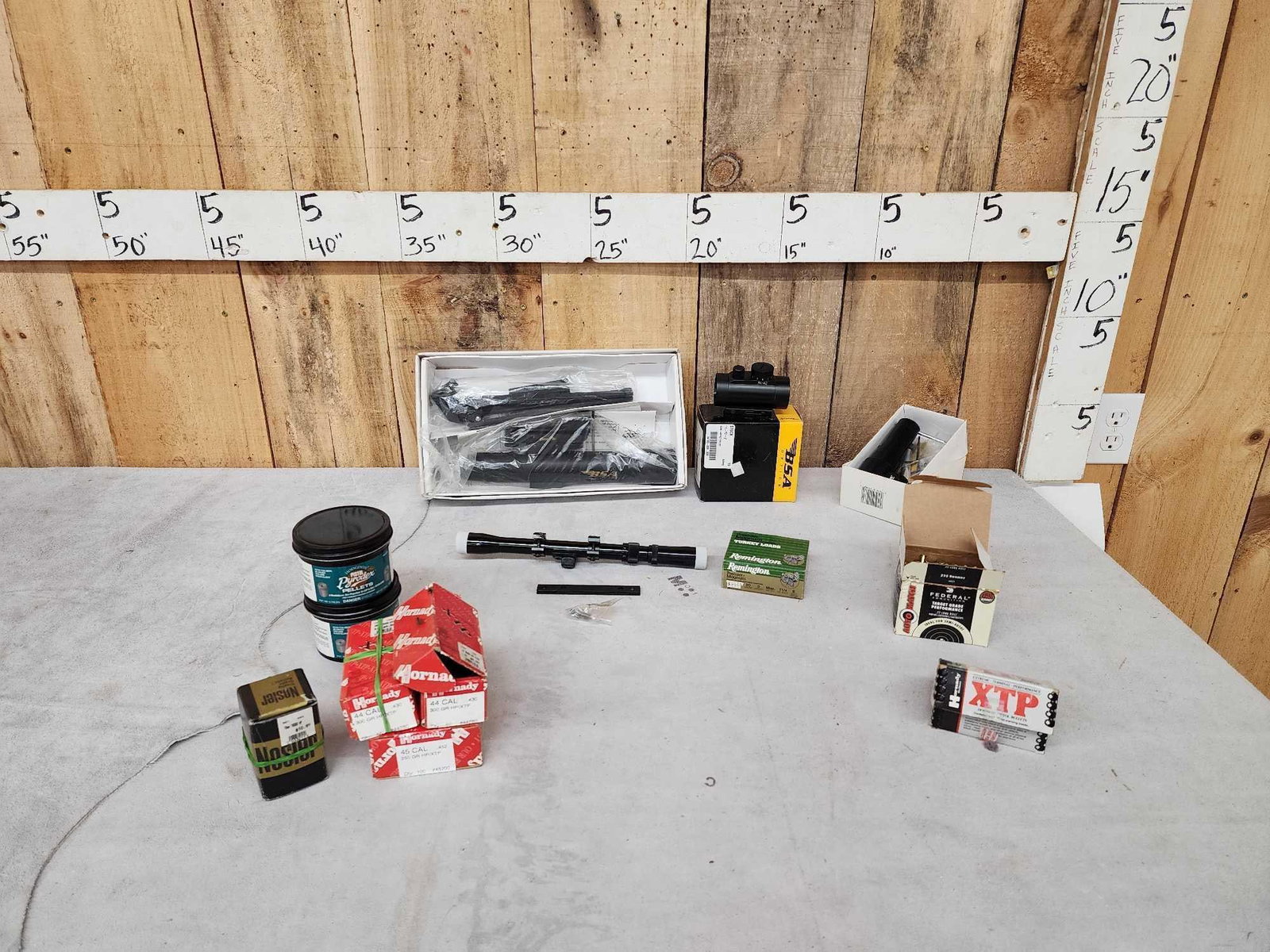 Optics , Ammunition , & Black Powder Supplies Lot: 89.9 Includes BSA Spotting scope , BSA red dot sight , Tasco scope , Simmons Bore Sight , 20ga turkey loads .22 Ammunition, projectile Bullets powder disks one money buys the lot