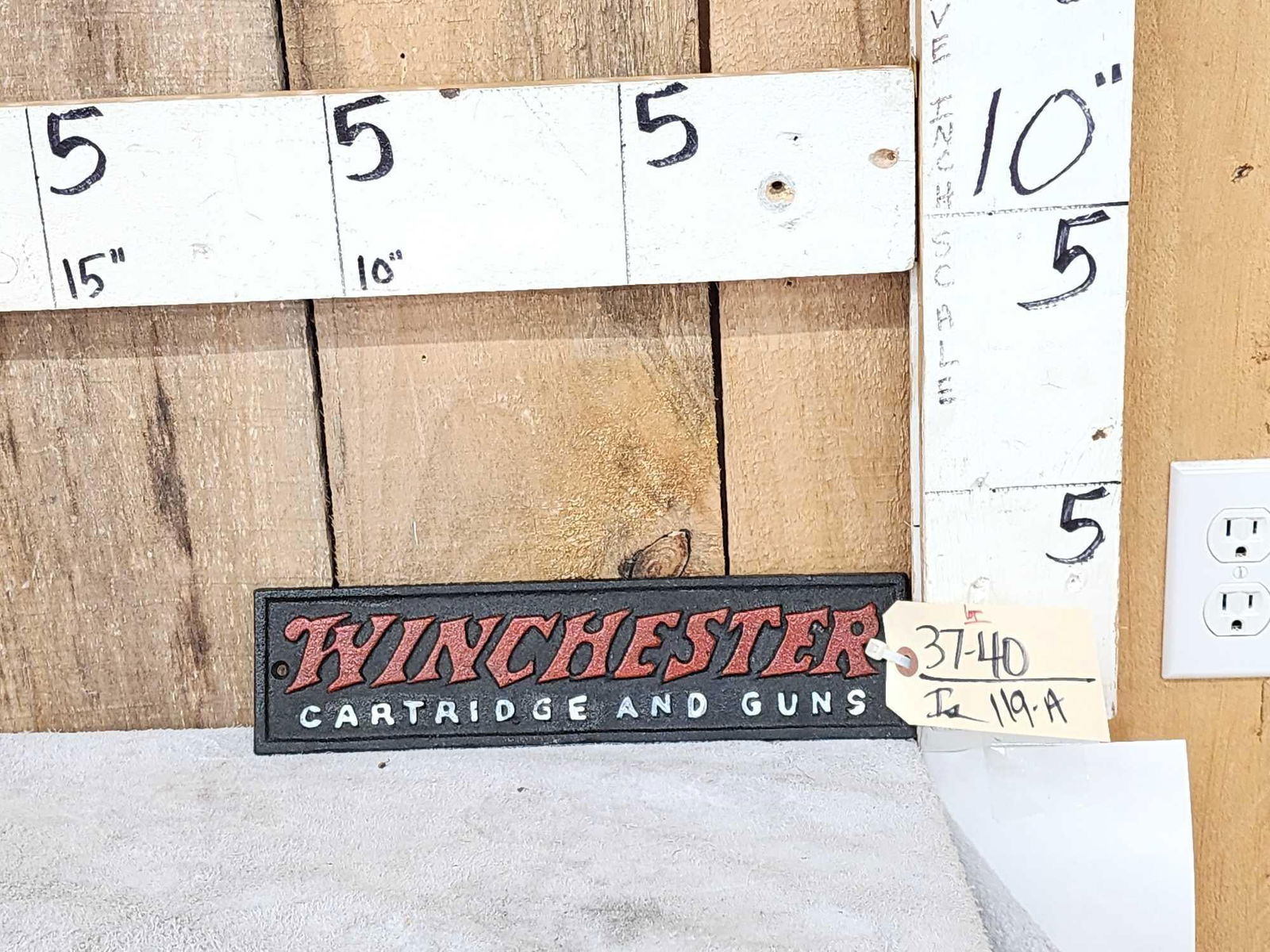 Winchester Cast Iron Sign: 37.40 Great decorative piece