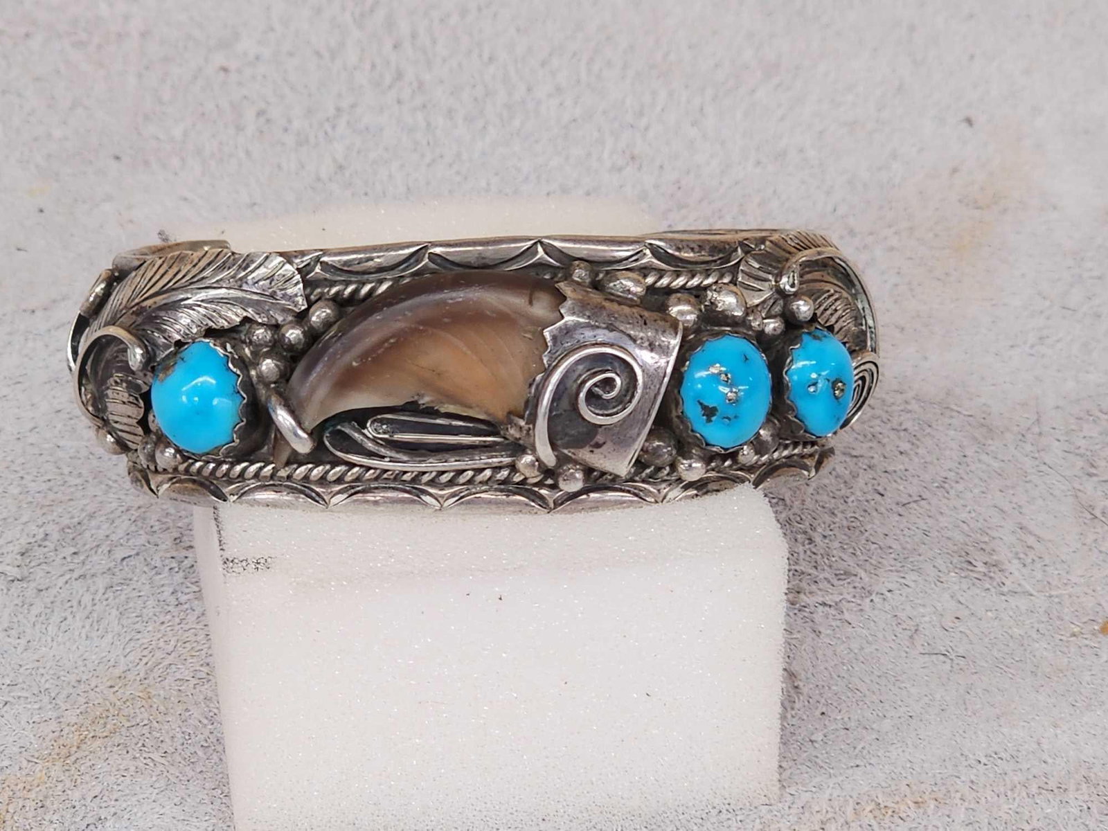 Navajo Sterling Silver Black Bear Claw & Turquoise Bracelet: 73.43 Finely tooled vintage piece of jewelry marked Navajo Sterling authentic black bear claw