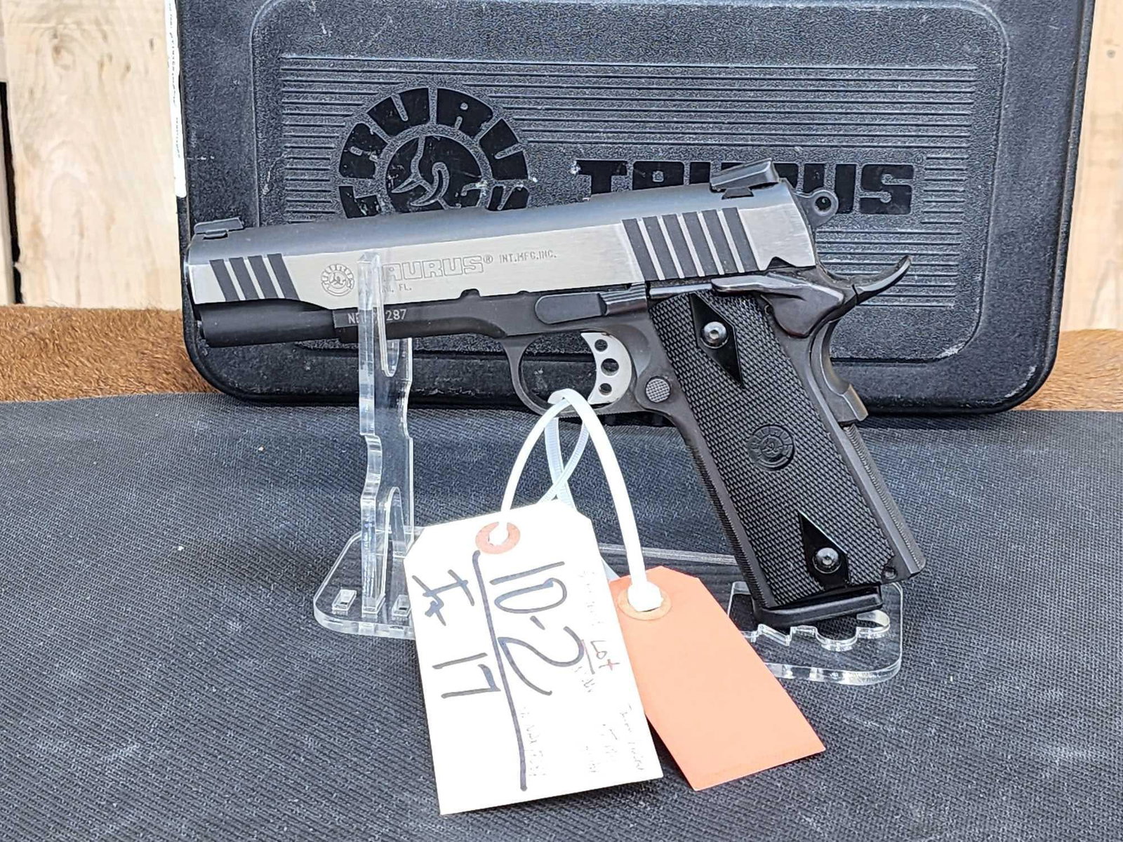 Taurus Model PT1911 .45acp Semi Auto Pistol: 10.2 Solid gun crisp action 5" barrel Shiny bore good rifling with hard case SN NDX77287