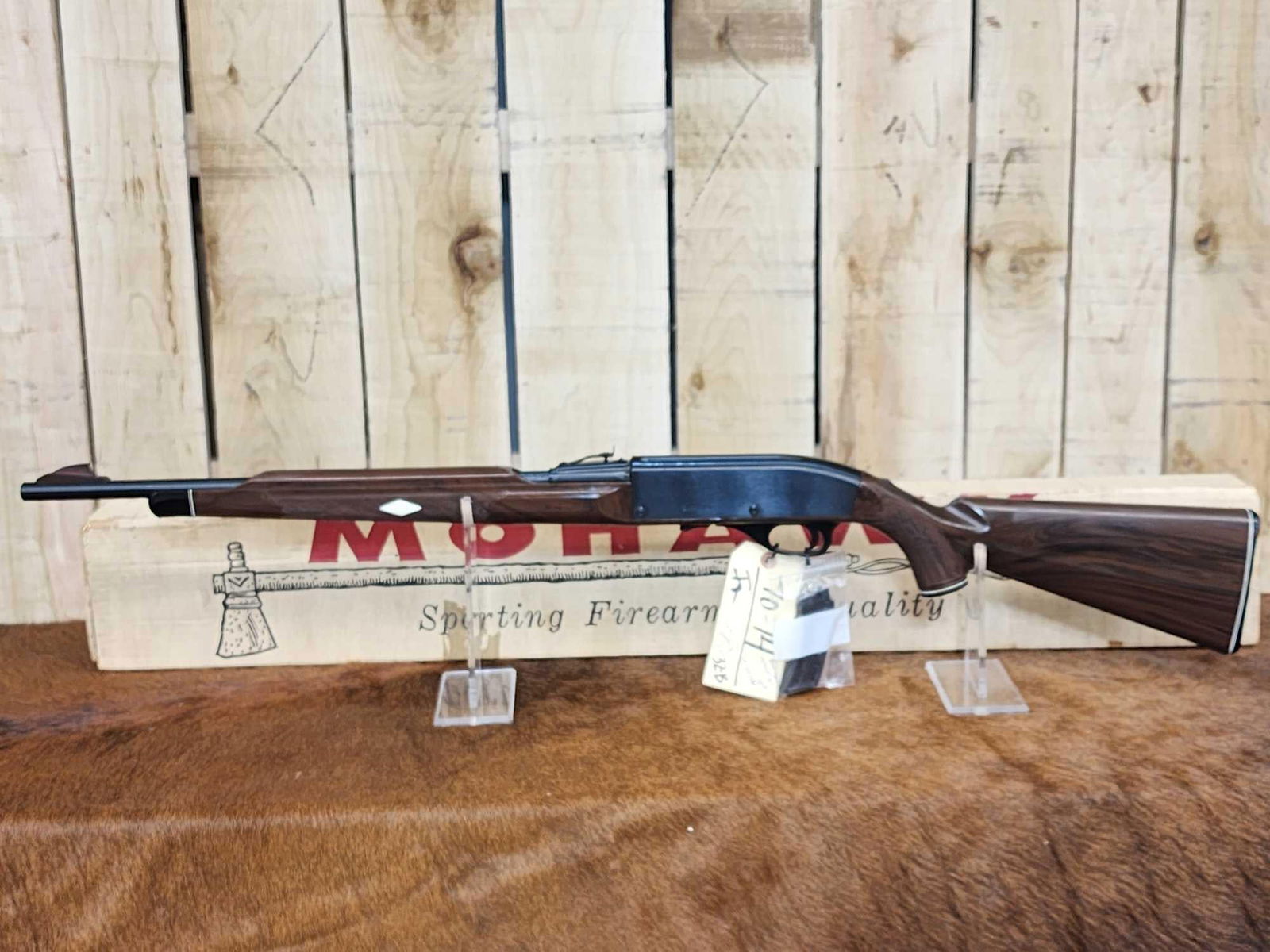 Remington Mohawk (Nylon ) .22 Semi Auto Rifle With Original Box: 70.14 Like new condition has seen little to no use matching serial numbers on gun box SN 2417382