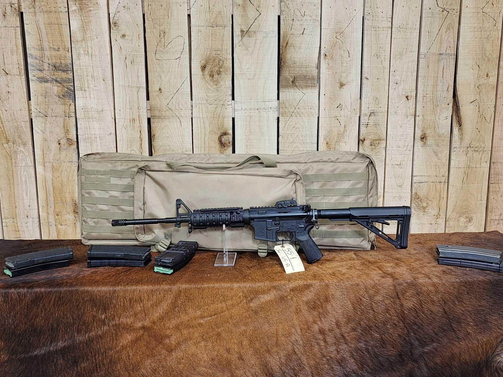 Del-Ton Inc Model DTI-15 5.56 Semi Auto Rifle: 55.1 Threaded barrel comes with 8 magazines tactical soft case SN DTIJ08733