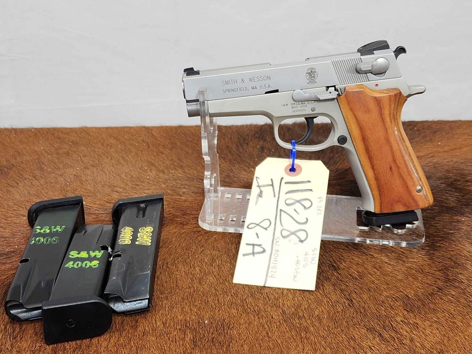 Smith & Wesson Model 410S .40s&w Semi Auto Pistol: 118.28 Nice clean gun stainless 4" barrel shiny bore good rifling with 3 extra mags SN BDH1424