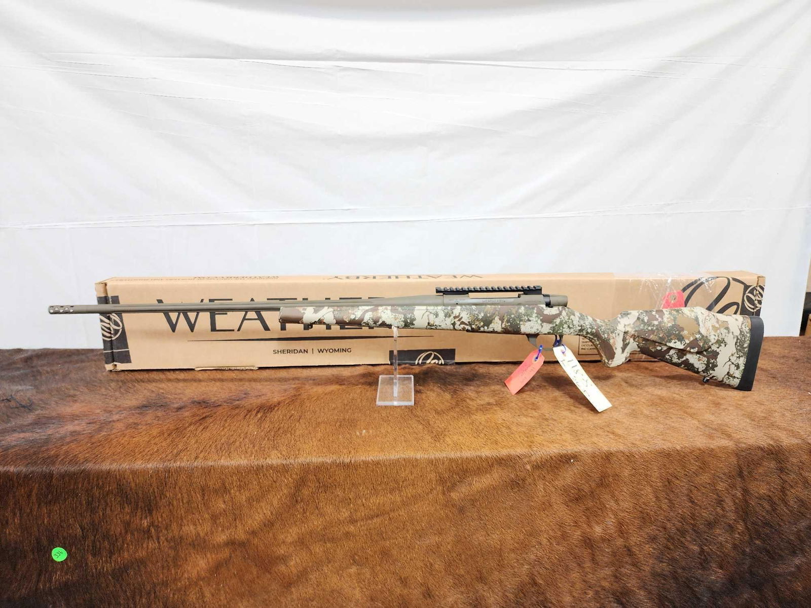 Weatherby Vanguard. 300 Wby Mag Bolt Action Rifle: 118.8 Nice gun cammo stock 24" fluted barrel shiny bore good rifling threaded with muzzle brake with box SN VB393805