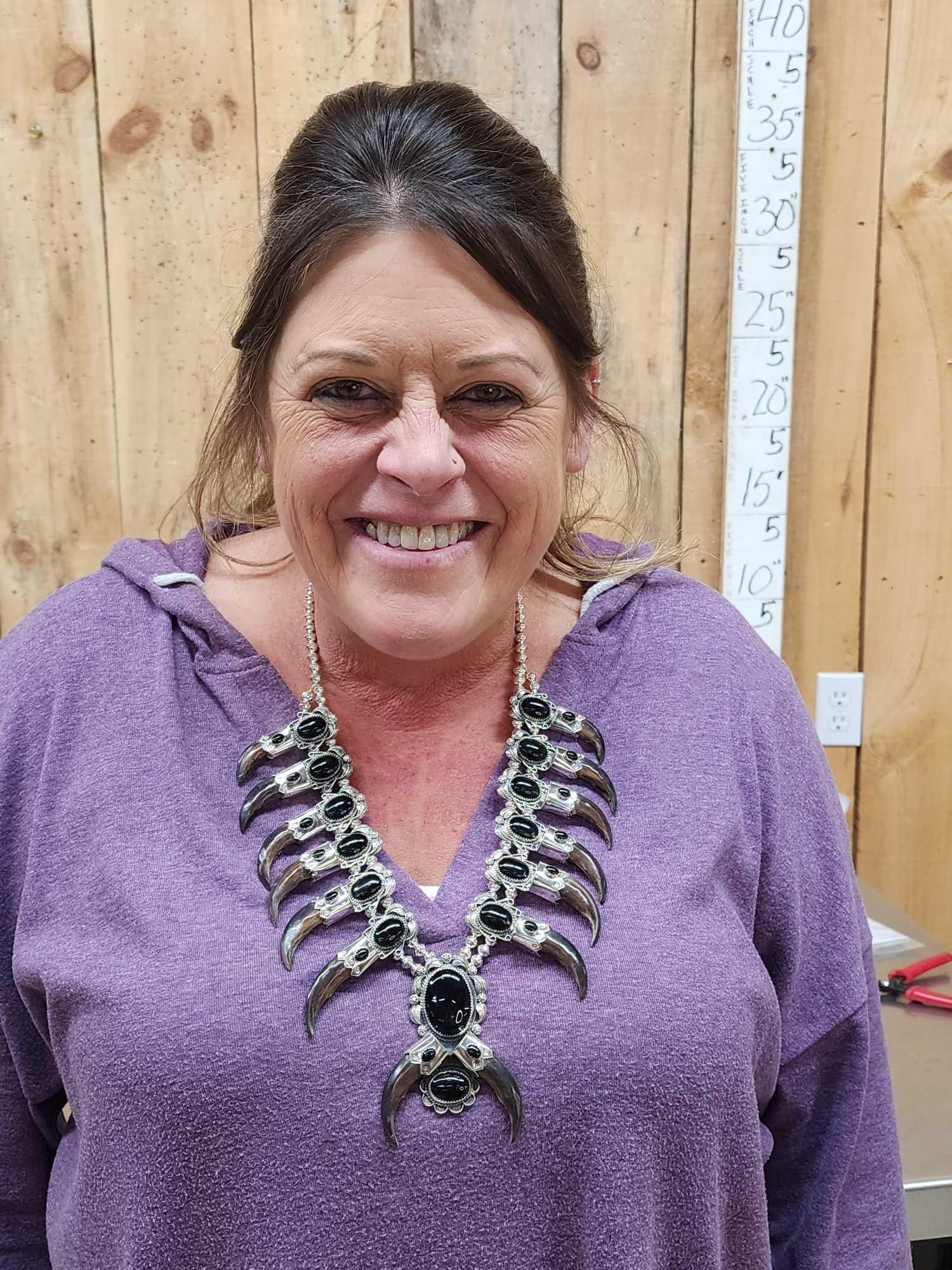 Gorgeous Squash Blossom Sterling Silver Necklace By Artist Kenny Ray McNeilly Jr: 35.82 Outstanding craftsmanship highly detailed tooling decorated with Alaskan Wolf Claws Black Onyx Stones by now RETIRED artist silver Smith Kenny Ray McNeilly Jr.Once these pieces are gone there wi