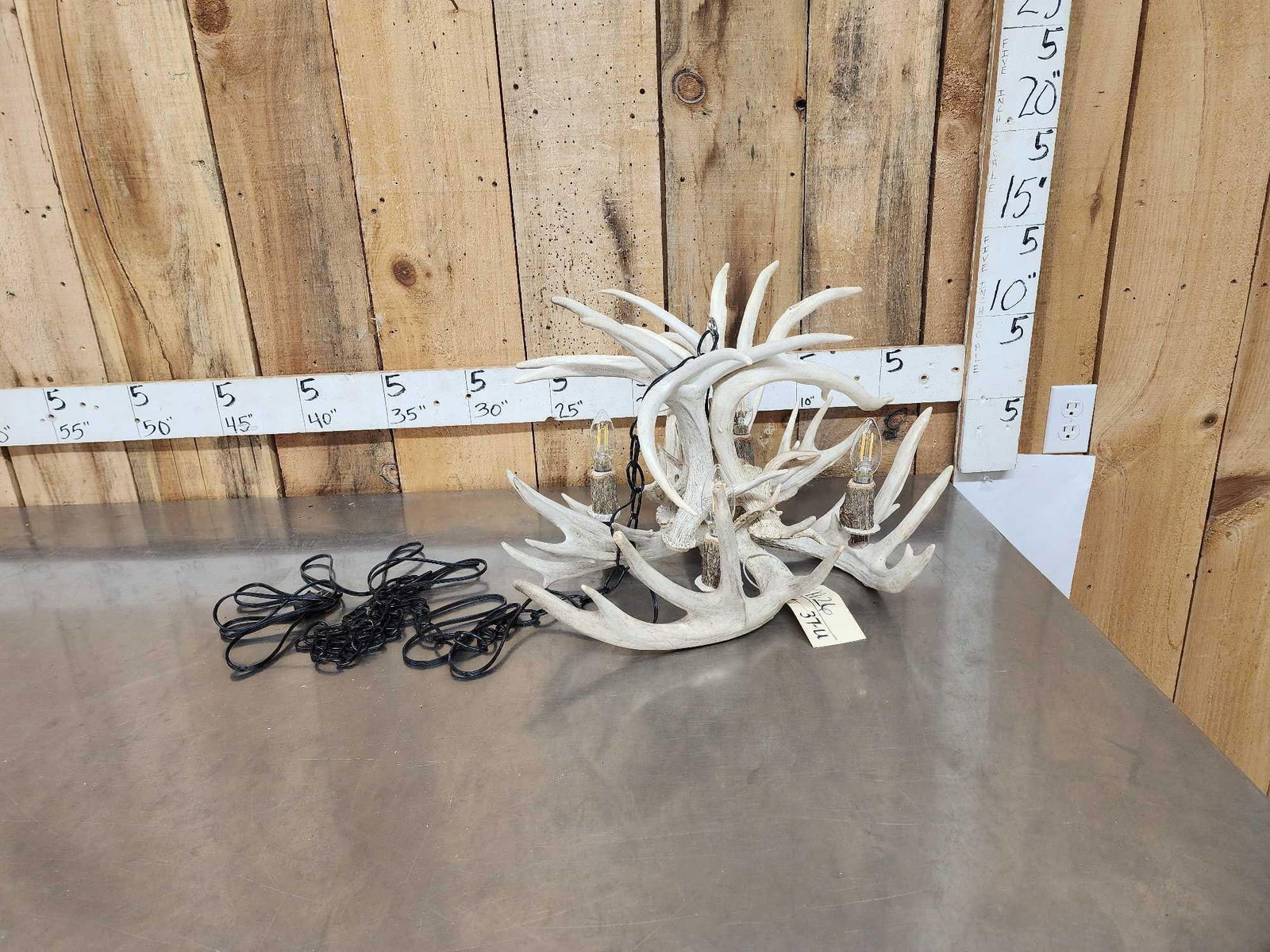 Brand New 4 Light Whitetail Antler Chandelier: 99.26 Professionally crafted using all real Whitetail Shed Antlers live edge wood socket accents the chandelier itself is about 22" wide x 14" tall hanging by a heavy duty adjustable chain to suit you