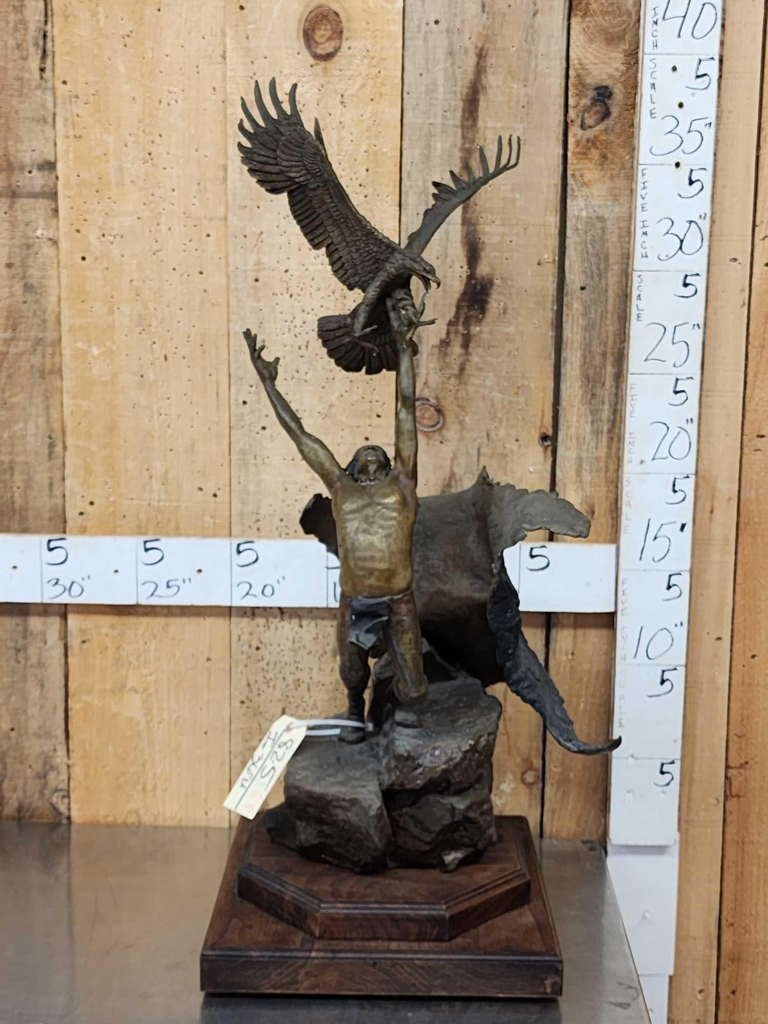 William "Wally" Shoop Bronze " The Spirit " ( Eagle Catcher ): 82.5 Signed numbered 28/50 Dated 1986 byThe late Wally Shoop 1941 - 2023 Great detail Depicting a Native American Catching an eagle in a sacred ceremonial right of passage overall dimensions 38" tall 