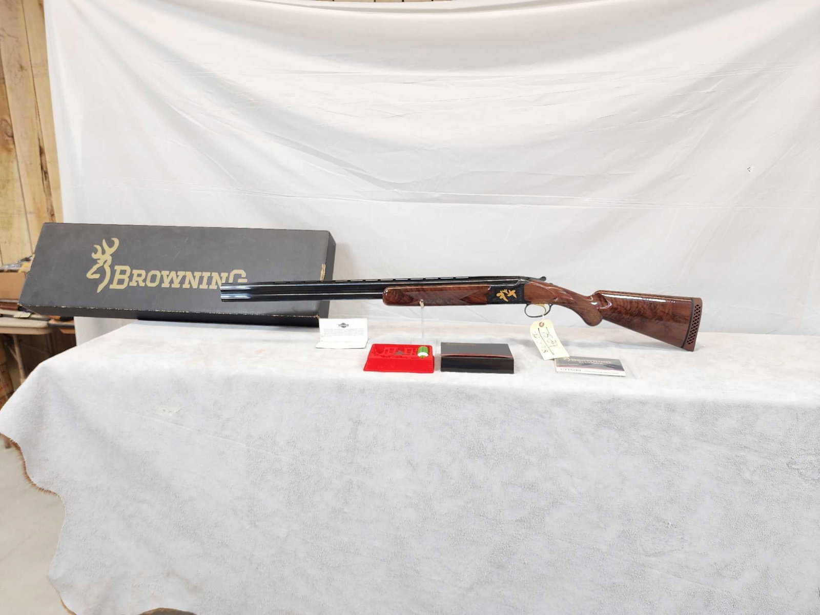 Browning Citori Lightning Grade BG6 12ga Over Under Shotgun: 75.39 New like new condition appears to be unfired with original box high grade walnut wood extensive engraving with gold inlays PRETTY GUN SN 19204MM131