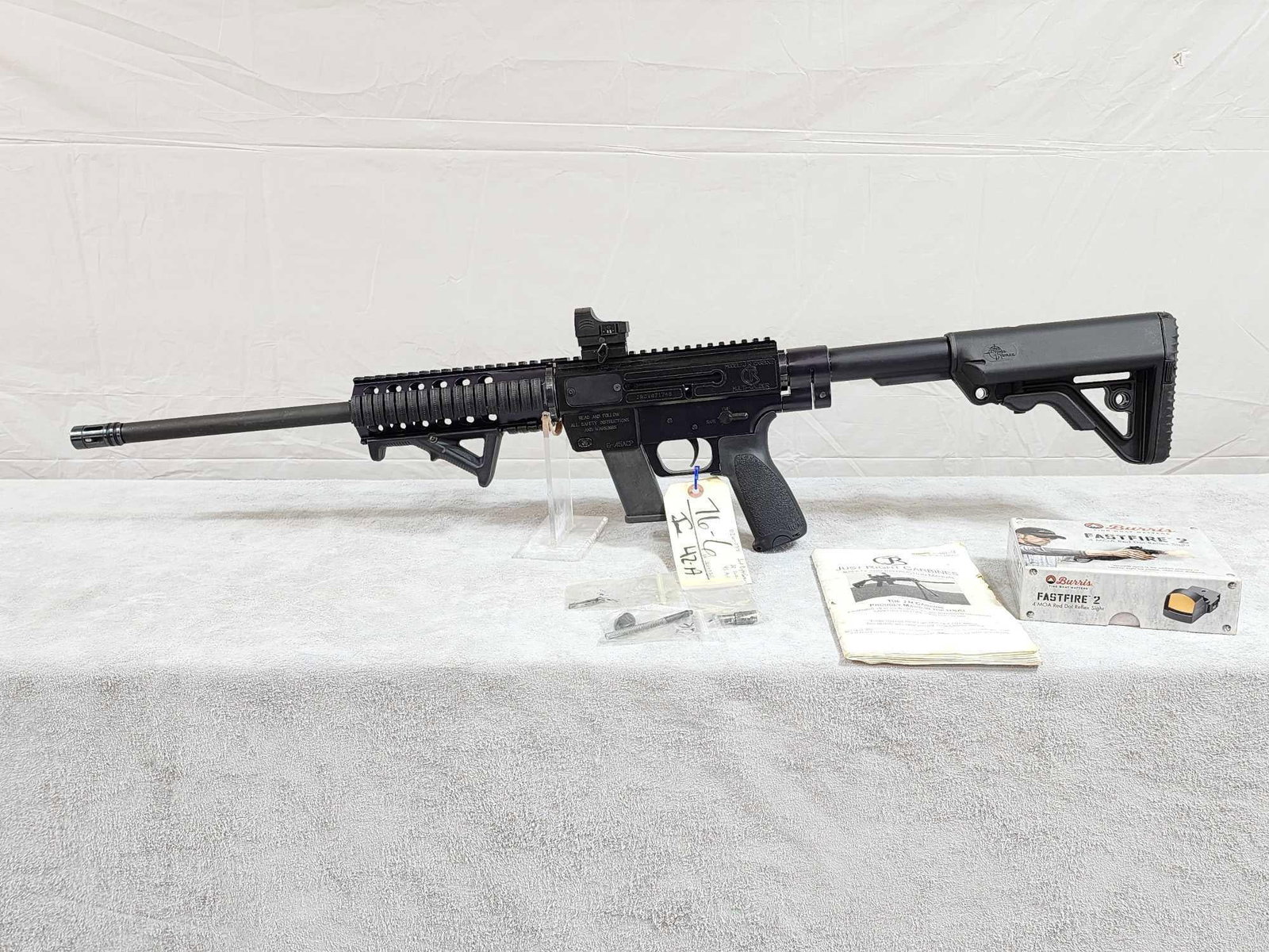 Just Right Carbines Model JR Carbine. 45 ACP Semi Auto Rifle: 76.6 With Burris Fastfire red dot optic takes a Glock mag shiny bore good rifling SN JRCV071745 comes with extra parts