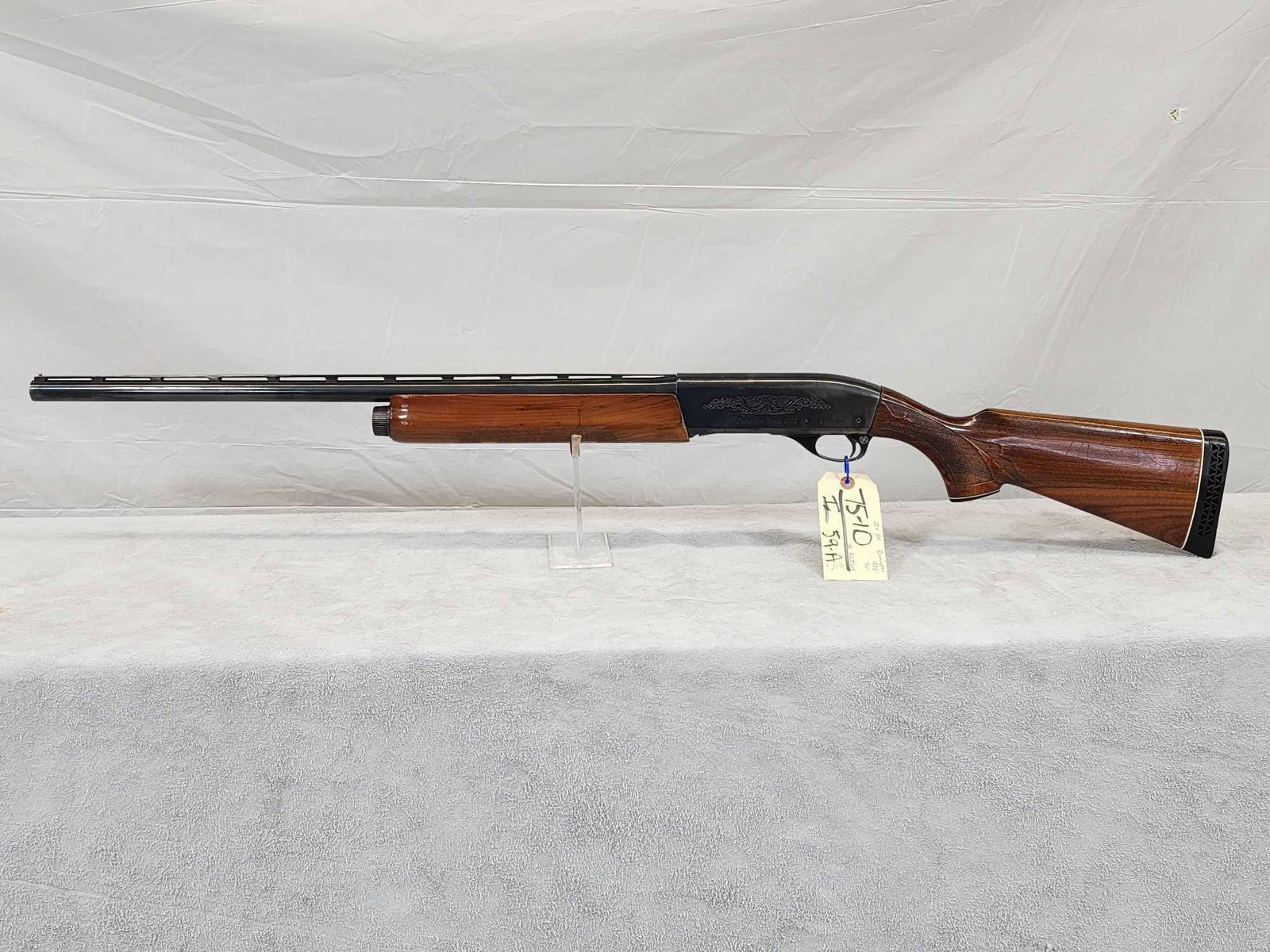 Remington Model 1100 12ga Semi Auto Shotgun: 75.10 Nice clean gun 25.5" barrel shiny bore vent rib SN R123720V