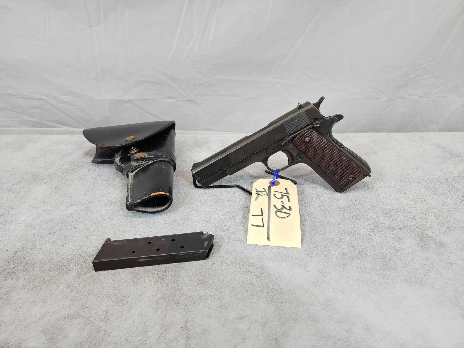 Colt M1911 A1 45ACP Marked US Property US Army: 75.30 Mfg 1944 great condition for its age crisp action 5" barrel shiny bore good rifling marked United States Property SN 1656619