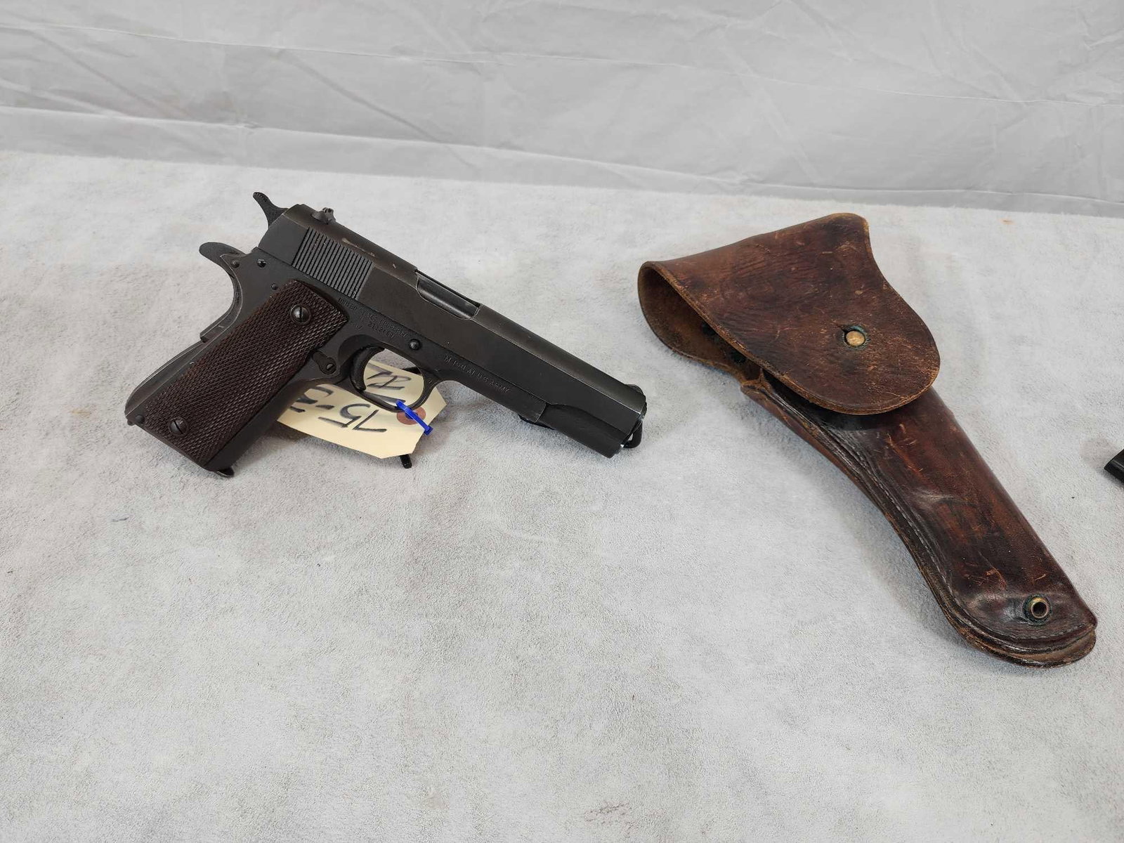 Ithaca M1911 A1 U.S. Army 45 ACP Semi Auto Pistol: 75.31 Mfg 1945 Marked United States Property RIA By the right grip great condition for its age crisp action good rifling shiny bore SN 2112447