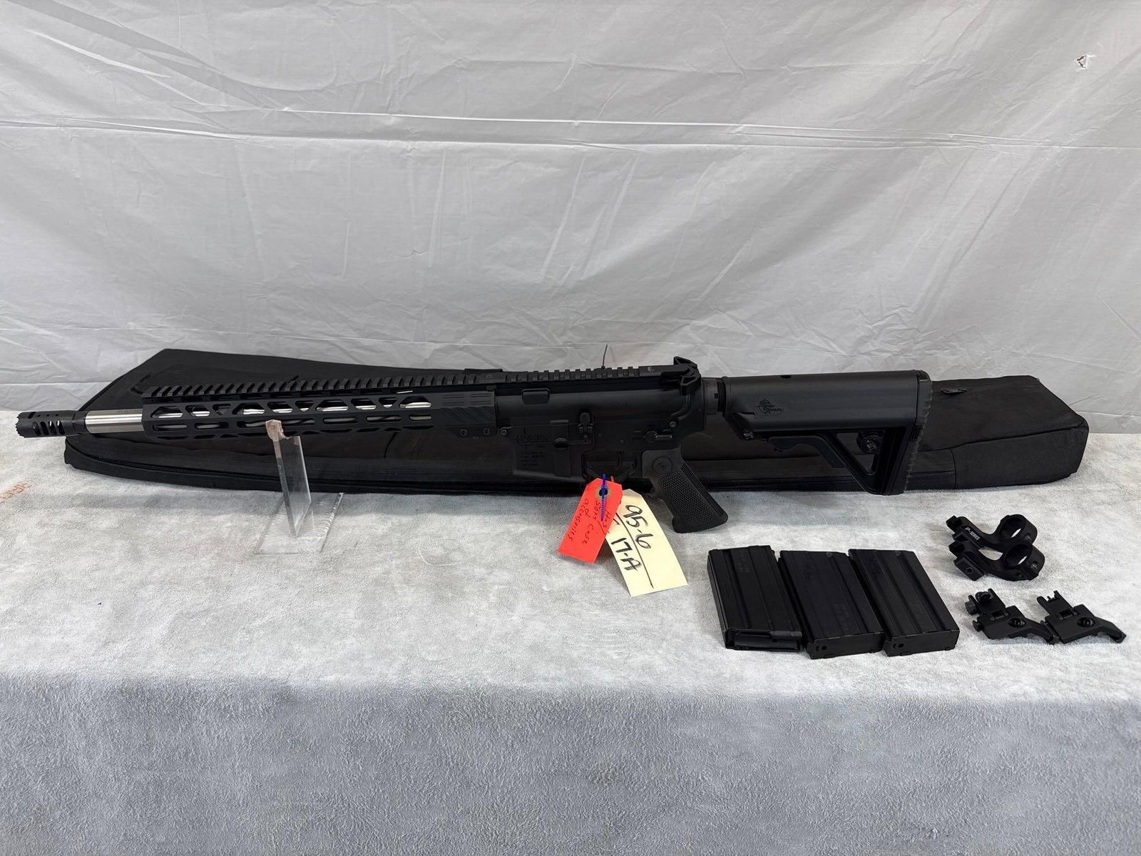 Rock River Arms LAR-15M 450 Bushmaster Semi Auto Rifle: 95.6 Excellent condition seen very little use if any 16 inch threaded stainless steel barrel shinny bore good rifling collapsible stock comes with 2 extra mags scope rings 45 degree open sights and ta