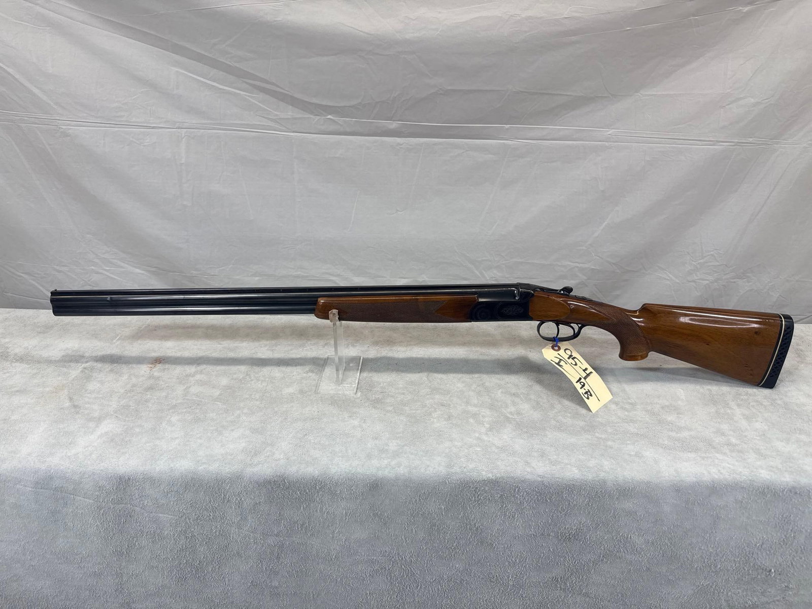 FIAS/Kassnar Imports 20 Gauge Over/Under Shotgun: 95.4 Solid gun 3 in mag 28 inch vent rib barrel mod/cyl chokes sn 12828
