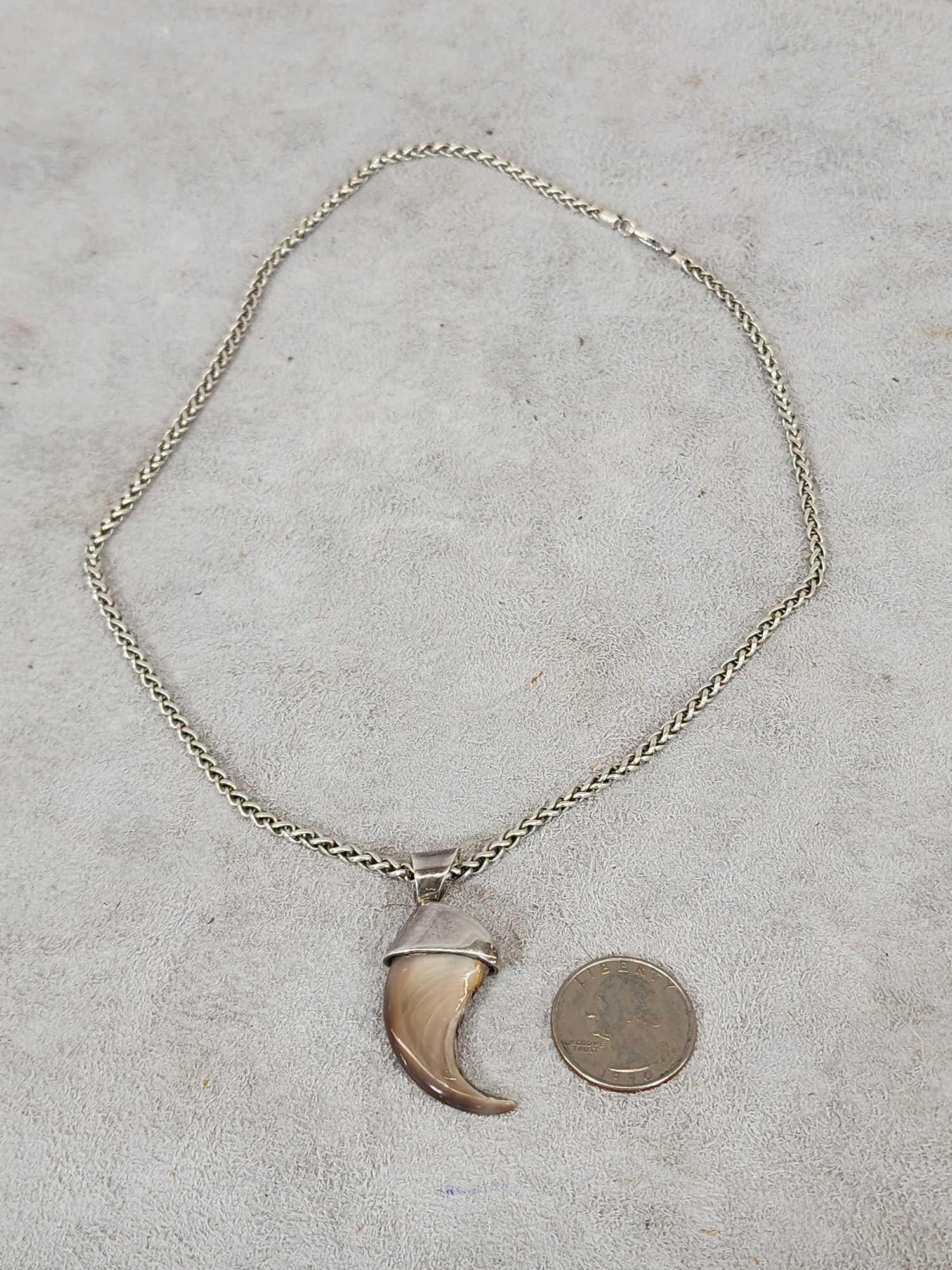 Sterling Silver Black Bear Claw Necklace: 95.8 Neat piece with chain makers mark
