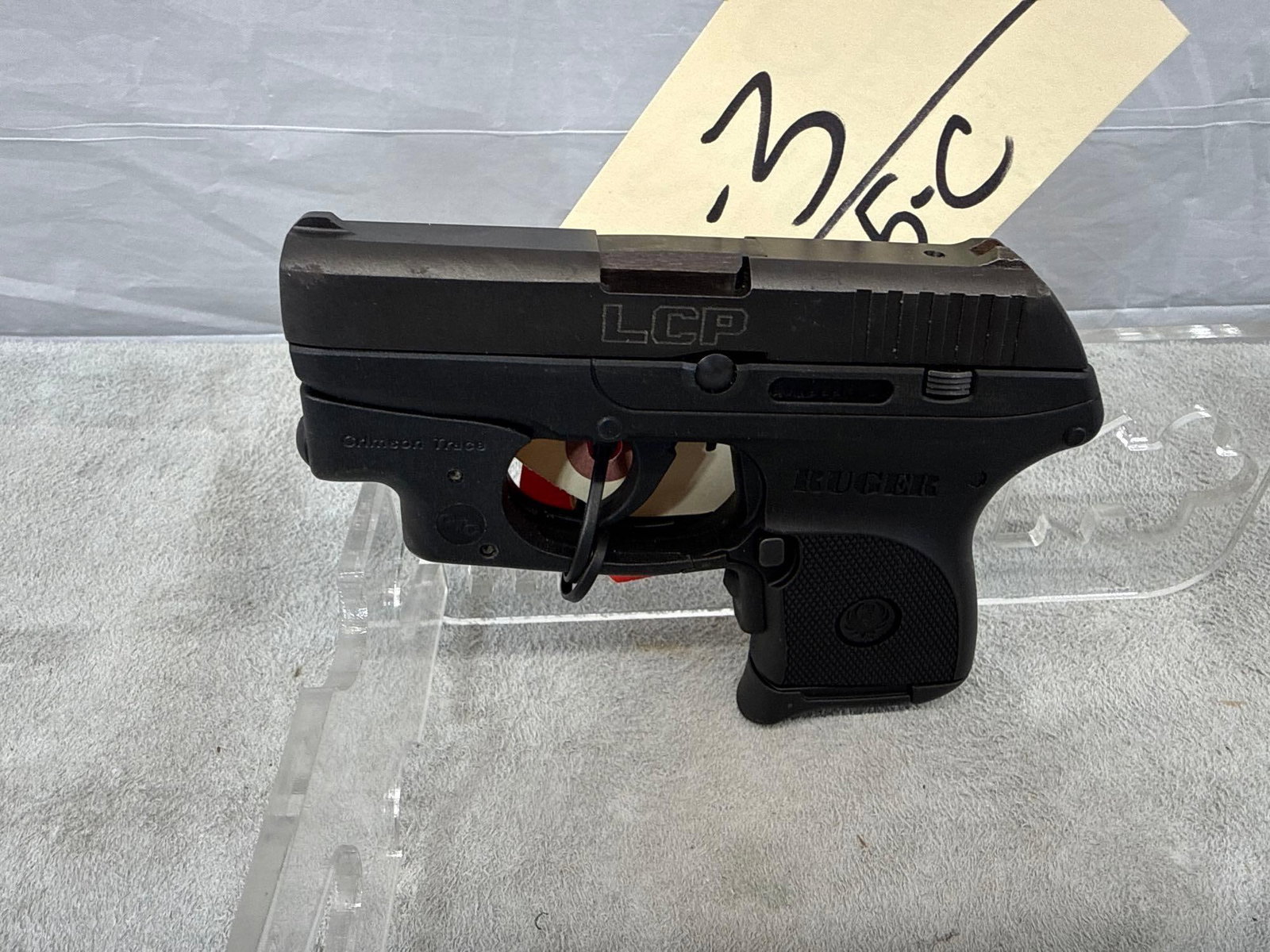 Ruger LCP-CT .380 Auto Semi Auto Pistol: 116.3 used 2.5 inch barrel good rifling shinny bore crimson trace laser comes with 1 mag holster and box sn 371222145